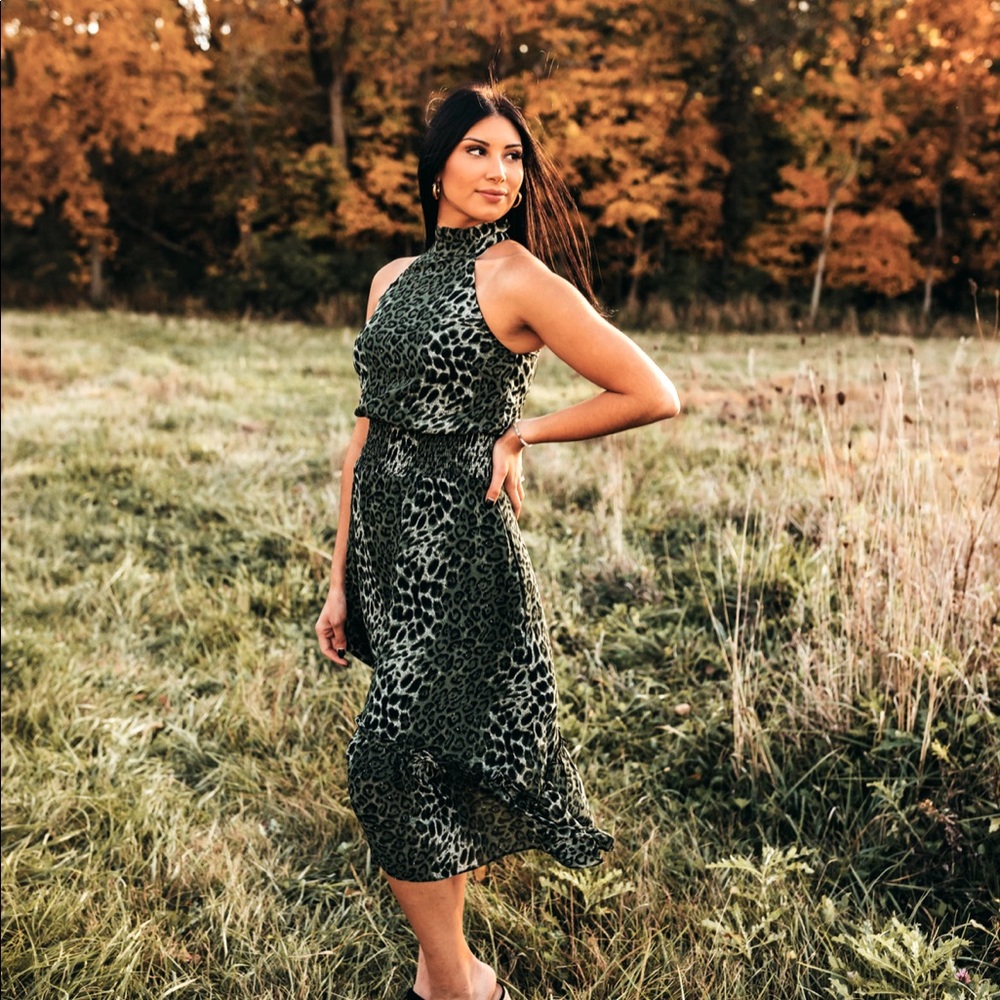 Elan shoulders out animal print halter dress